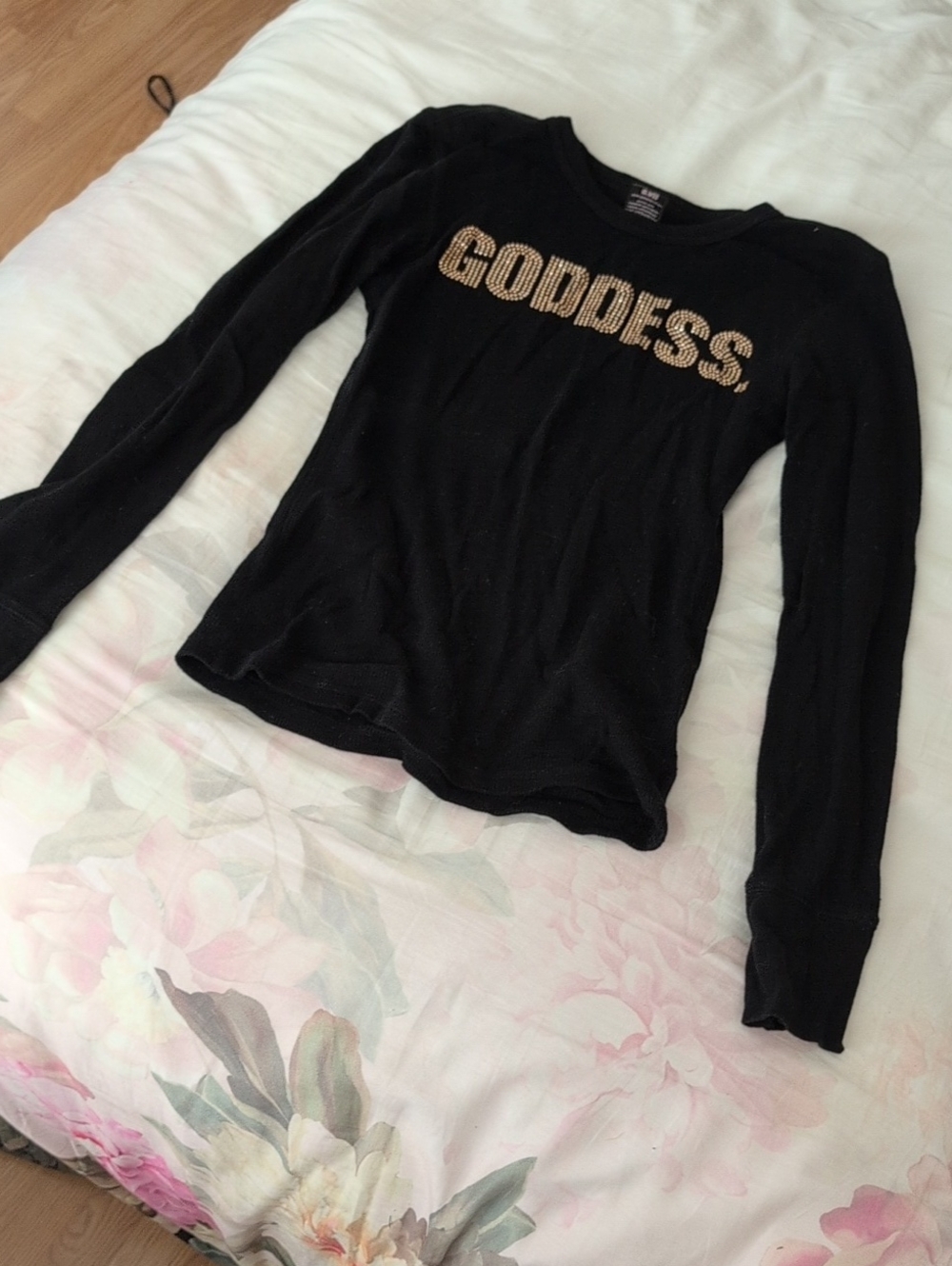 Black Long-Sleeve "GODDESS" Top with Gold Stud Accent